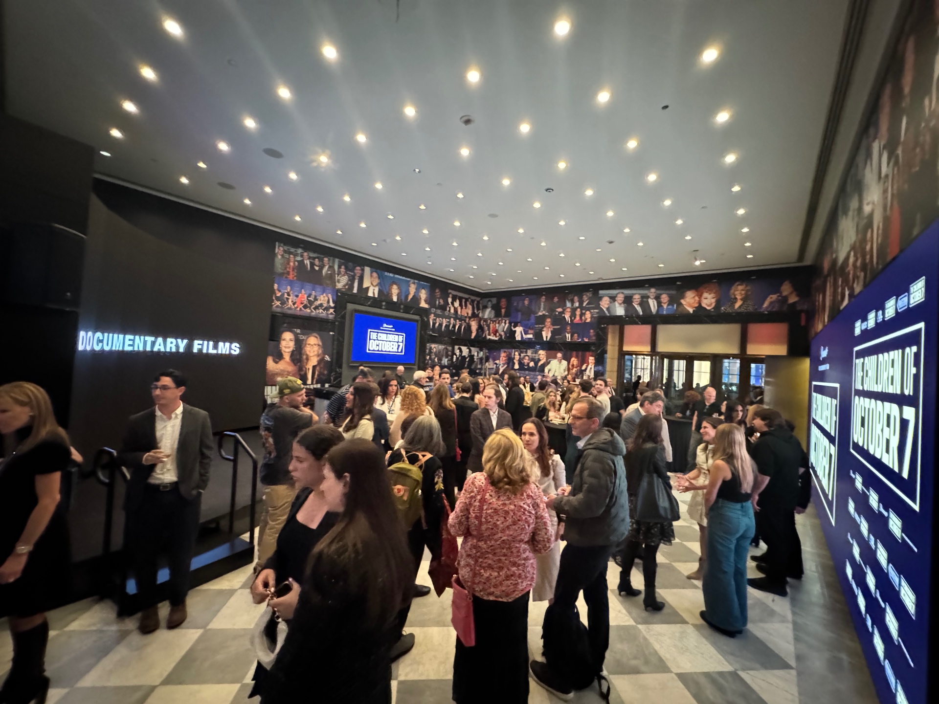 Packed lobby reception at the New York premiere of The Children of October 7 at the Paley Center.