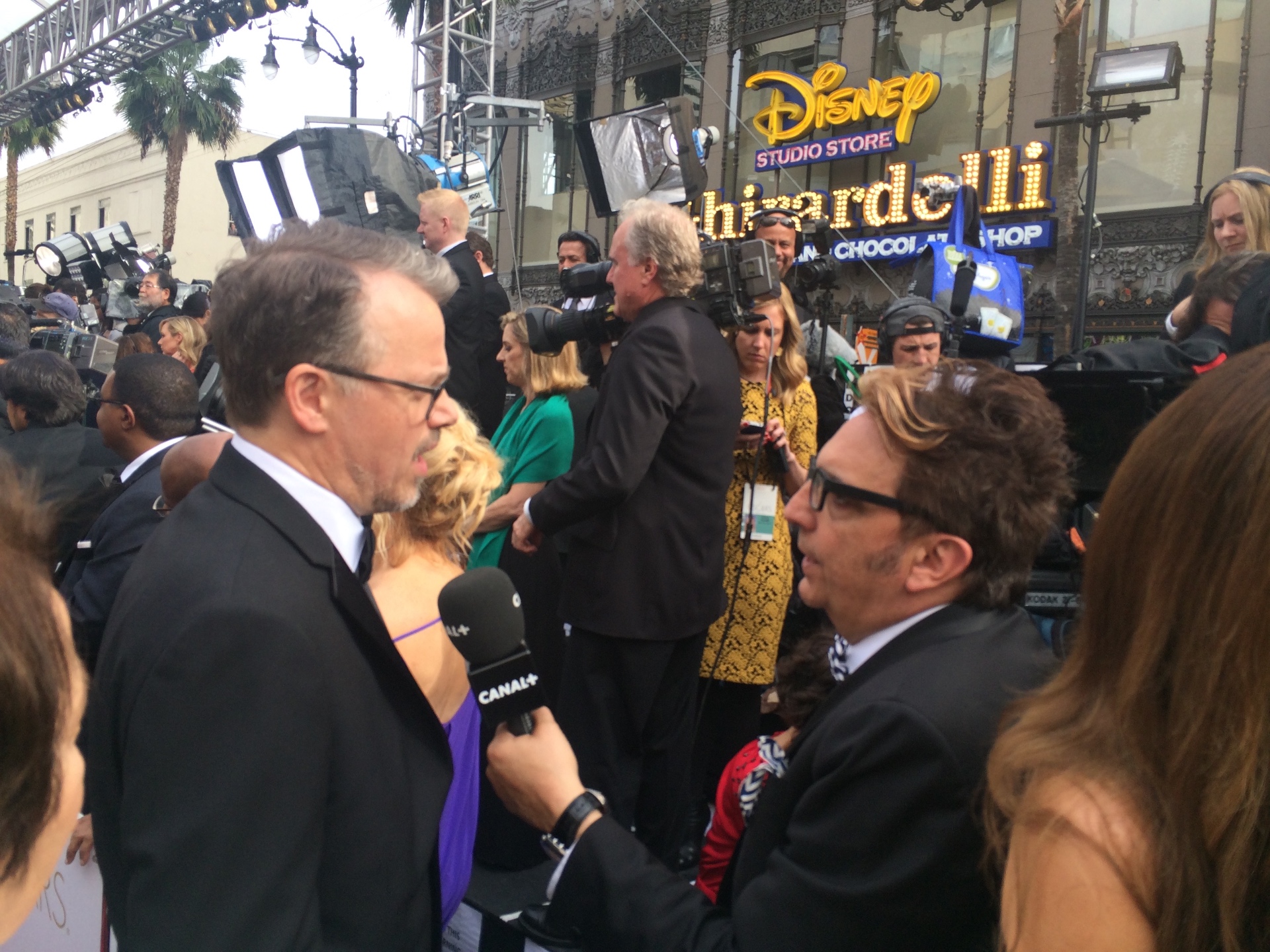 Client interviewed by CANAL+ on the Academy Awards red carpet outside the Dolby Theatre in Hollywood.