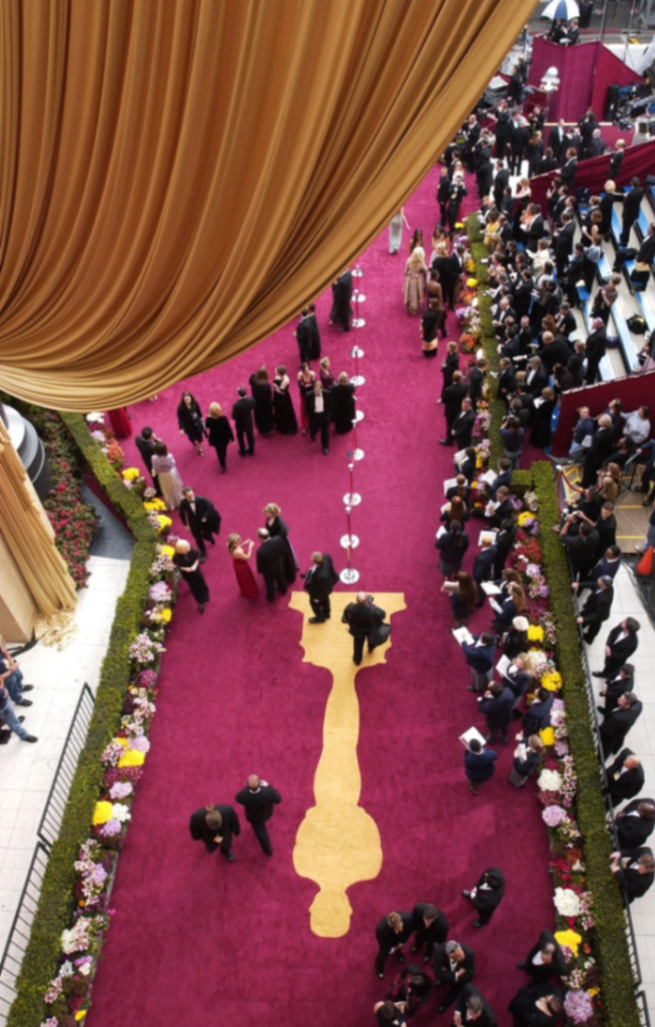 Aerial view of the Oscars red carpet with gold curtain