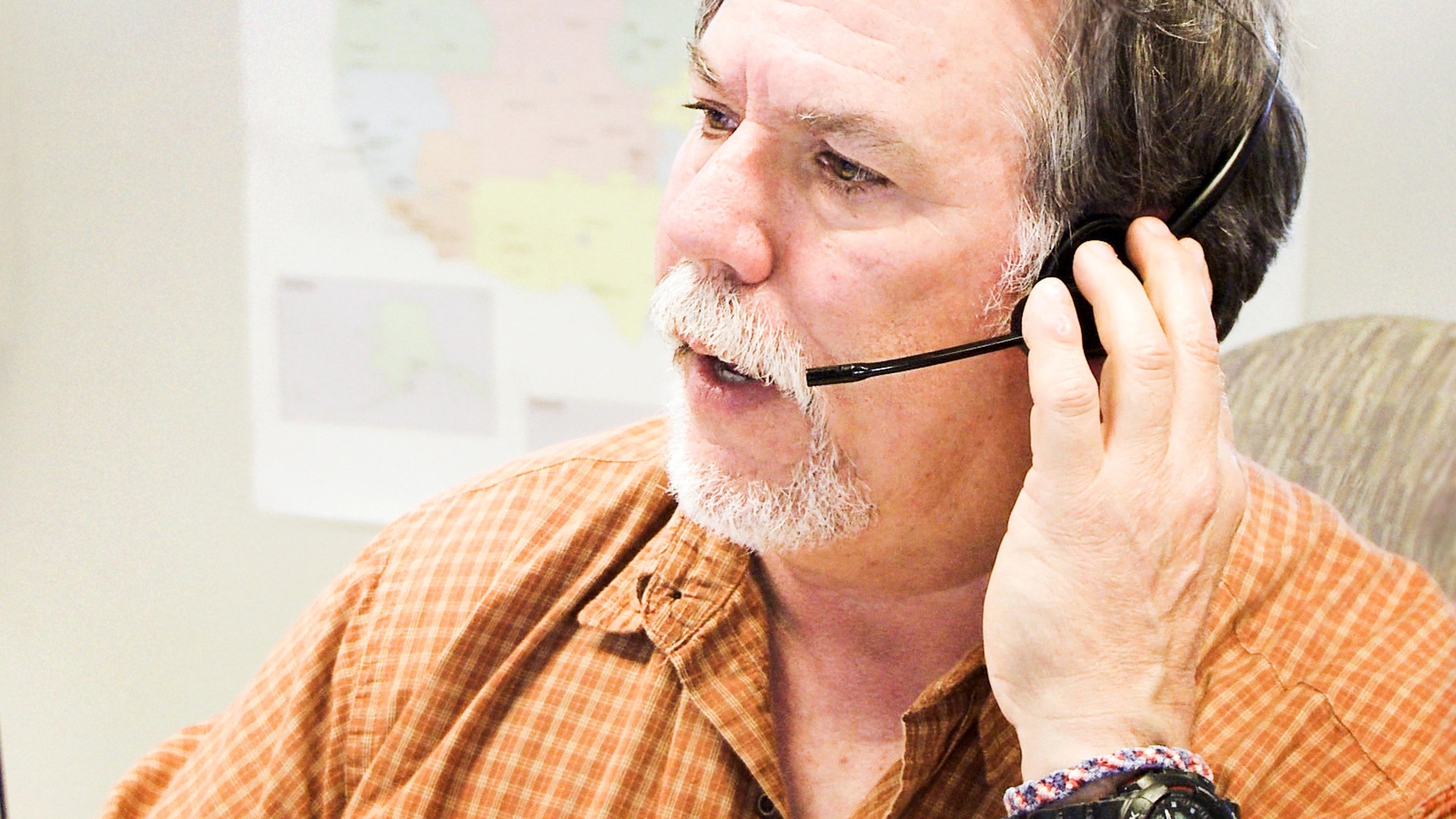 A Veterans Crisis Line responder takes a call at the Canandaigua, New York call center