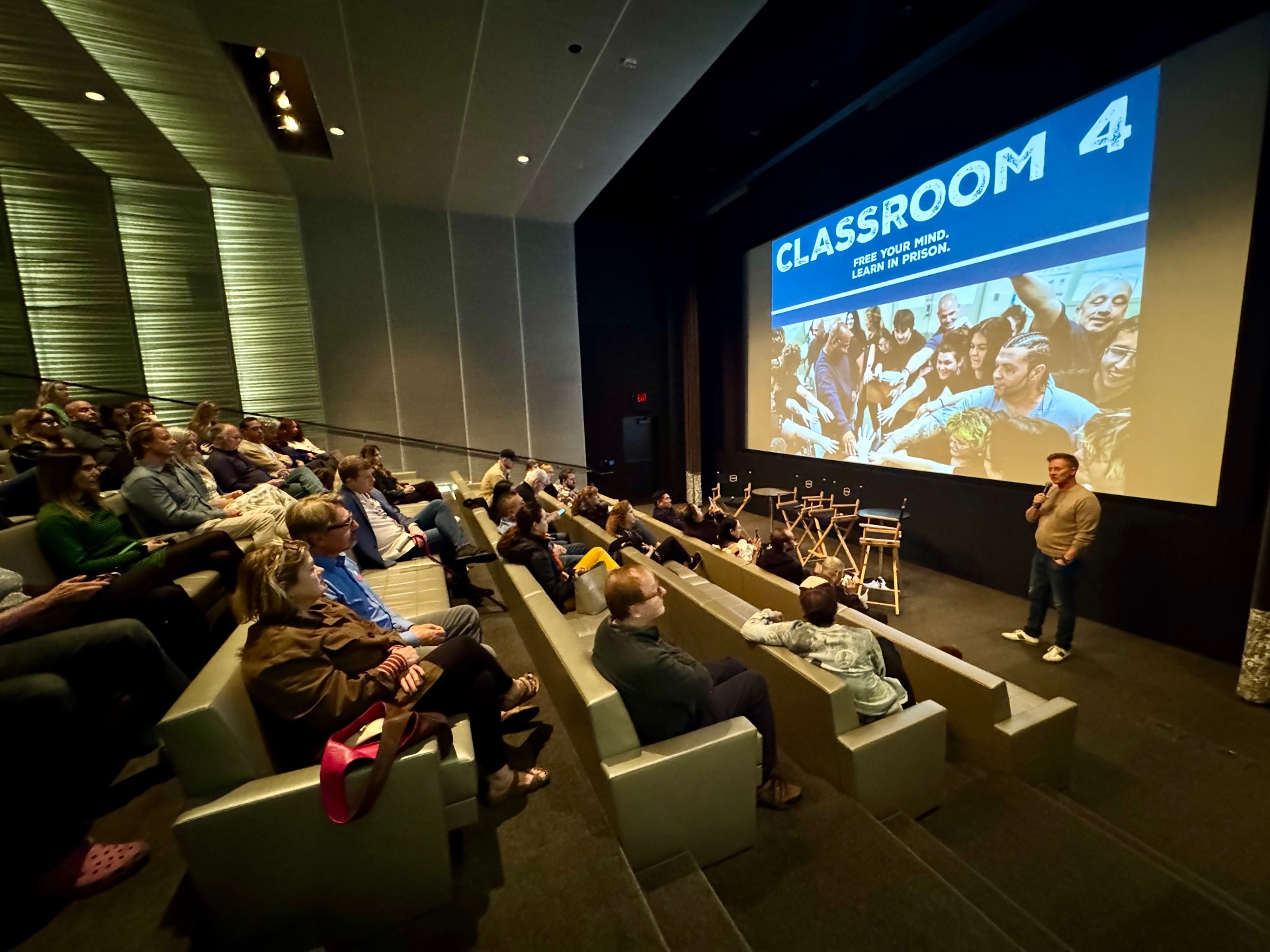 Director addresses a full house during a Classroom 4 FYC screening Q&A
