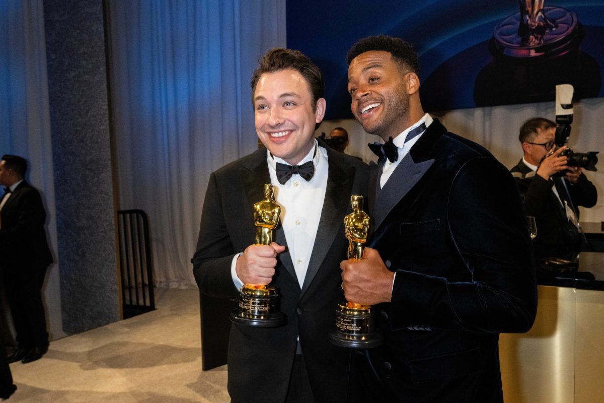 Ben Proudfoot and Kris Bowers with their Academy Award® for Best Documentary Short Film